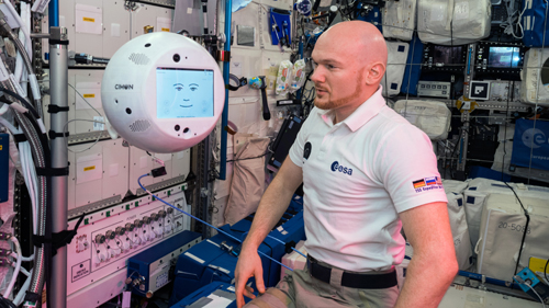 German ESA astronaut Alexander Gerst instructs CIMON, an AI-enabled astronaut assistant, aboard the International Space Station. (Photo credit: DLR