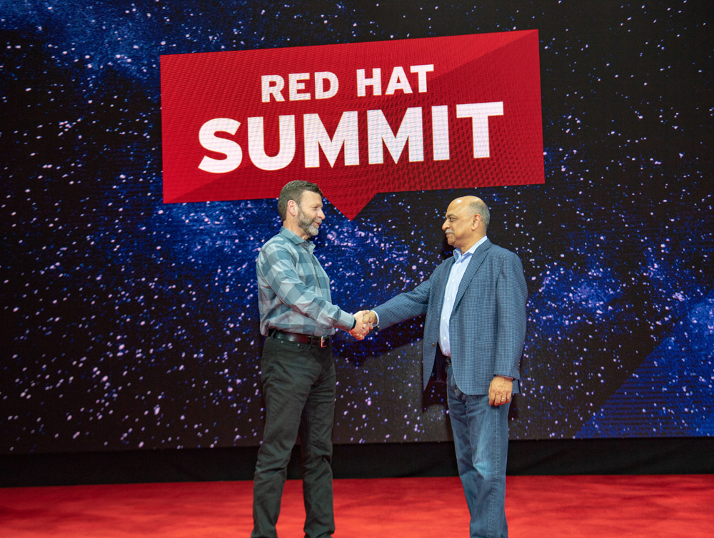 Paul Cormier, Executive Vice President, and President Products and Technologies, Red Hat, and Arvind Krishna, Senior Vice President, IBM Hybrid Cloud, at Red Hat Summit 2018 in San Francisco on May 7, 2018. (Credit: Red Hat)
